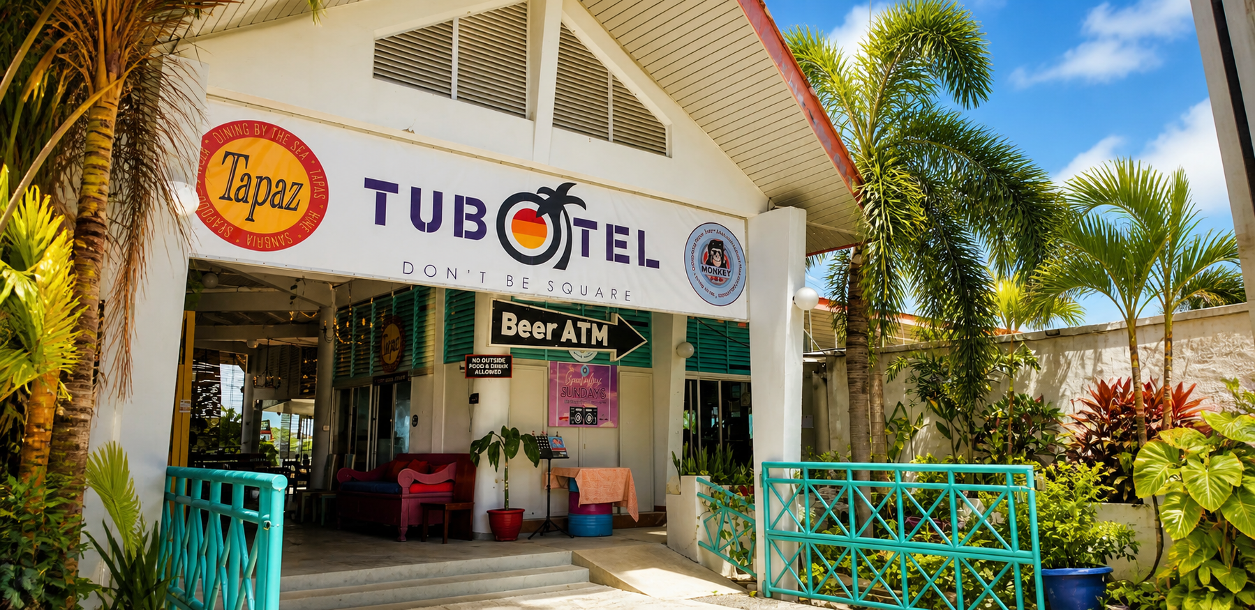 Tapaz and Tubotel signage above the restaurant entrance